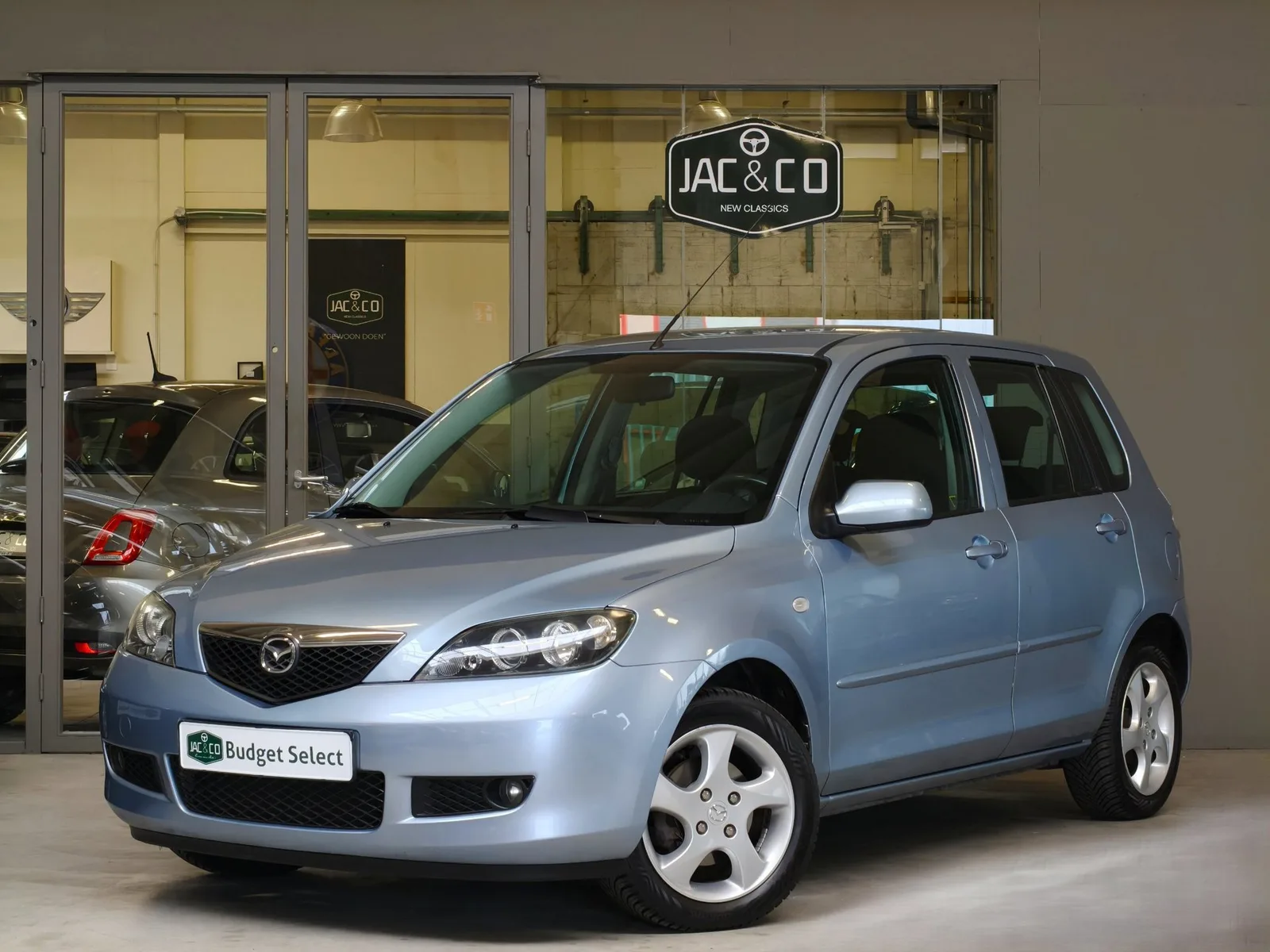 Mazda 2 (2006) — foto 1