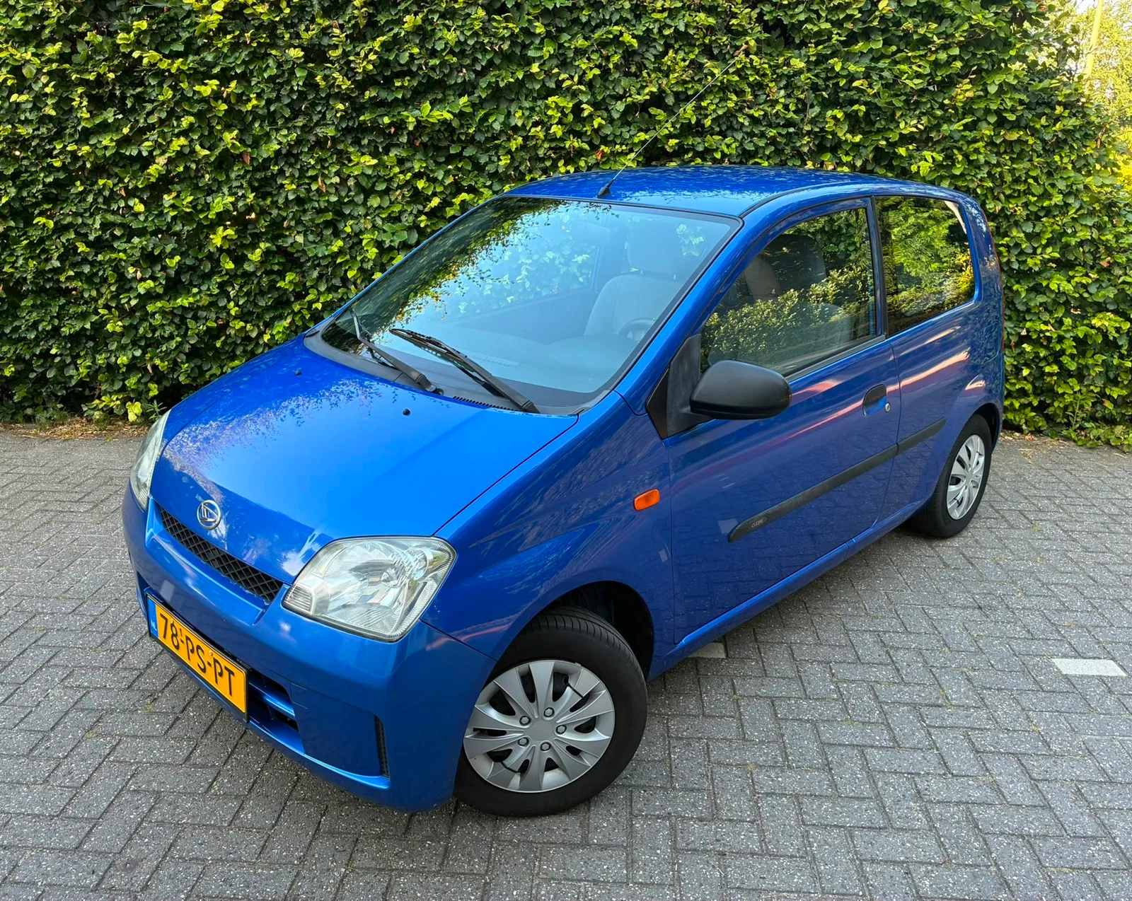 Daihatsu Cuore (2004) — foto 1