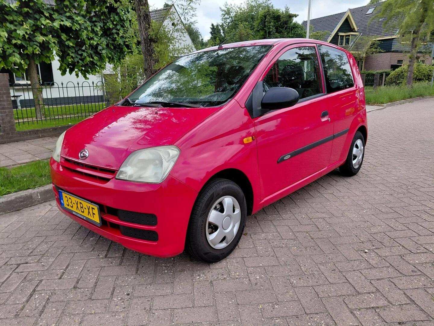 Daihatsu Cuore (2007) — foto 1