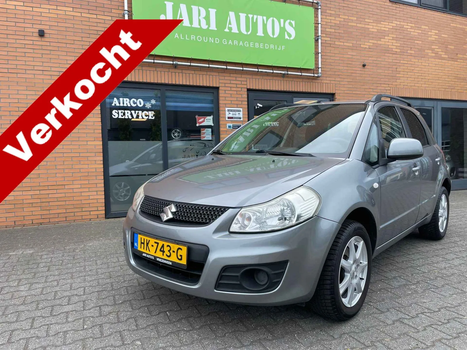 Suzuki SX4 (2010) — foto 1