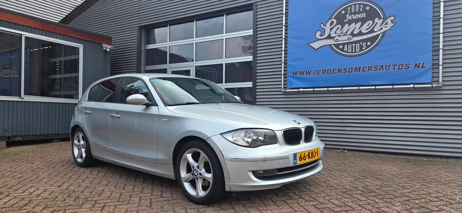 BMW 1-Serie (2009) — foto 1