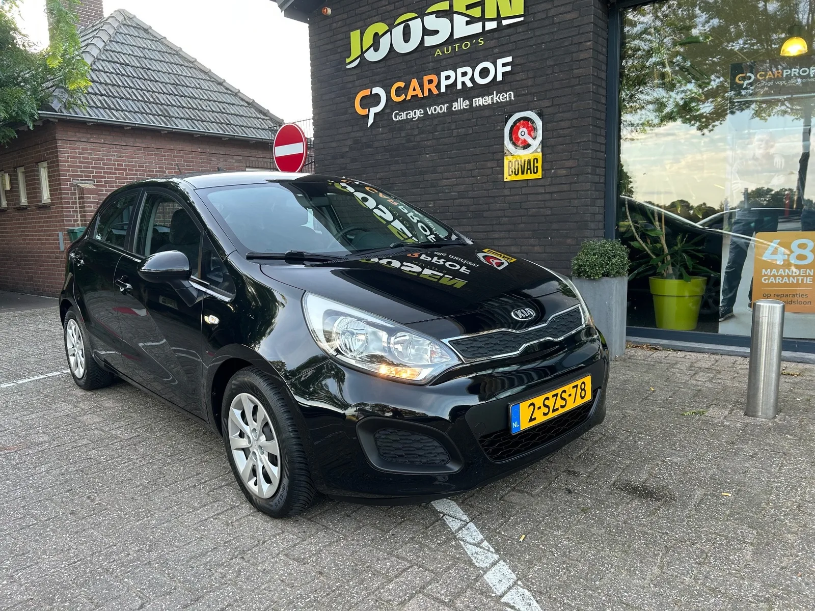 Kia Rio (2014) — foto 1
