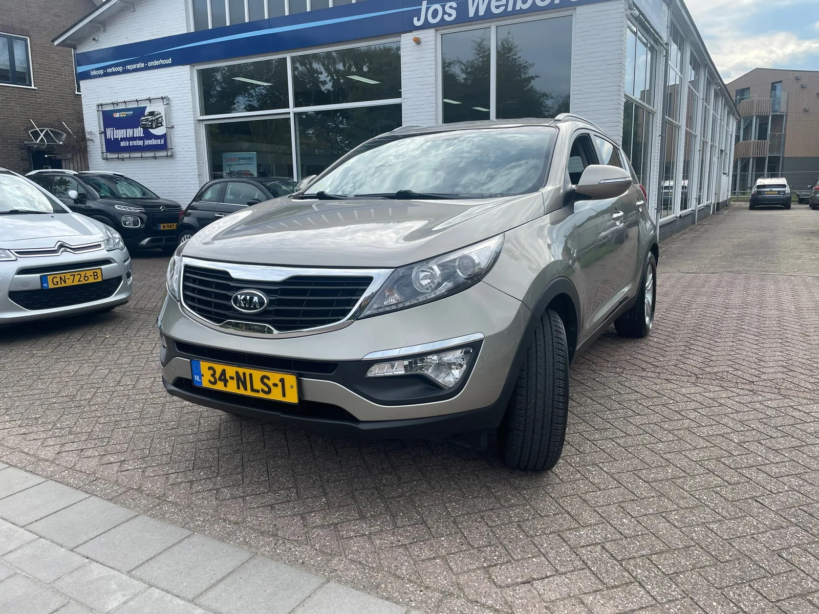 Kia Sportage (2010) — foto 1