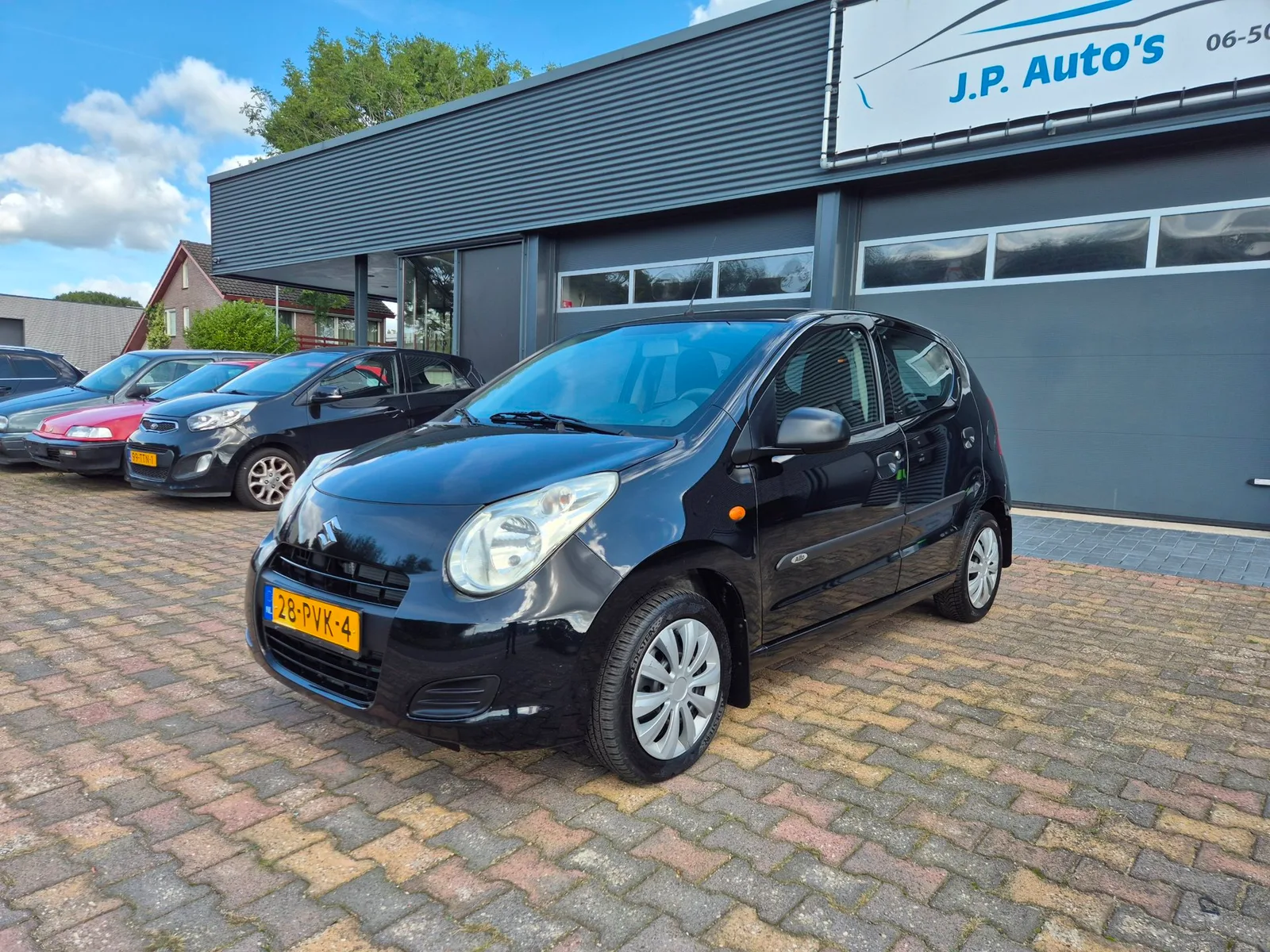 Suzuki Alto (2011) — foto 1