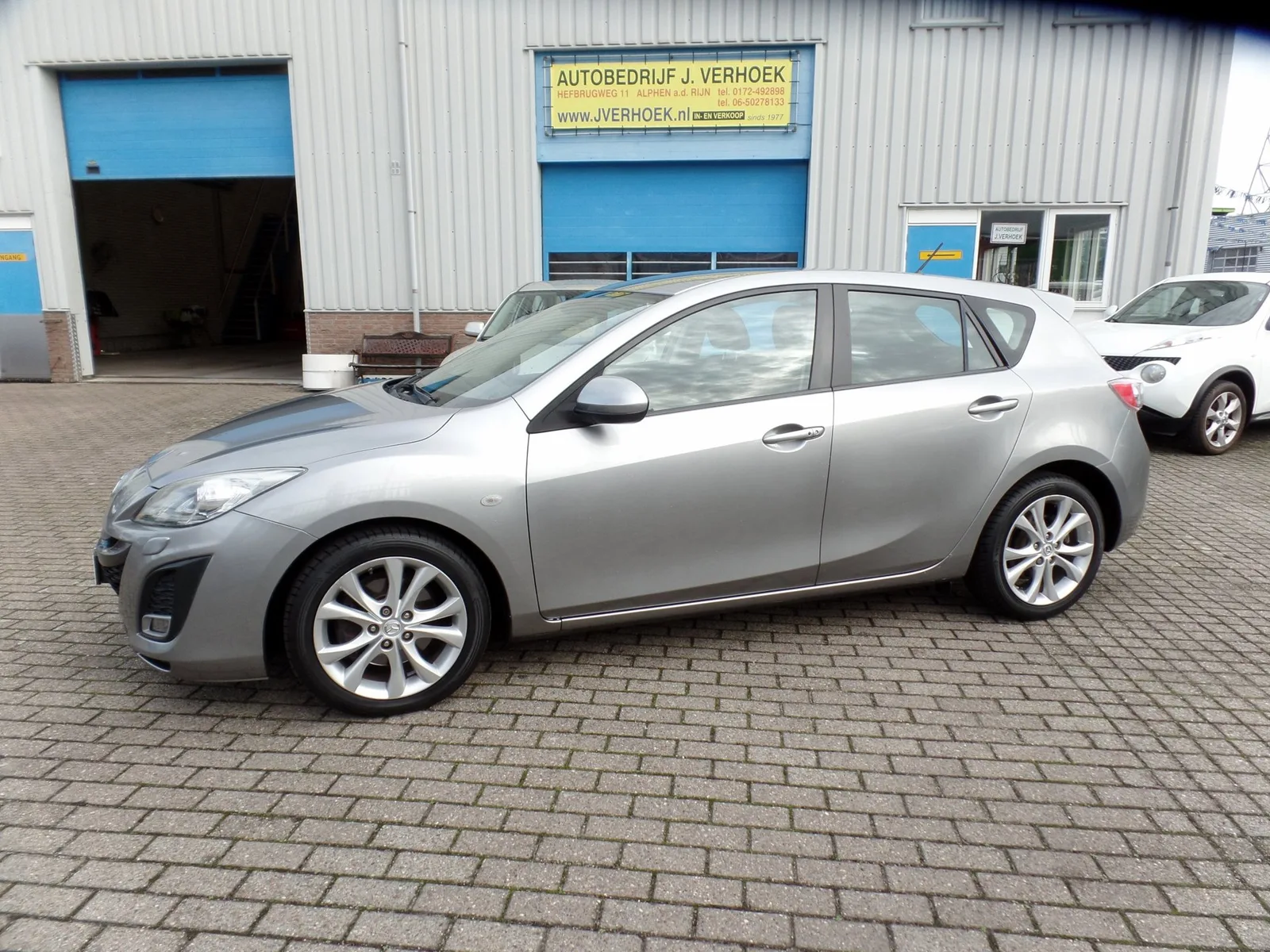 Mazda 3 (2011) — foto 1