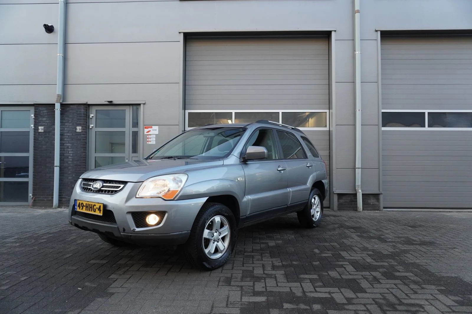 Kia Sportage (2008) — foto 1