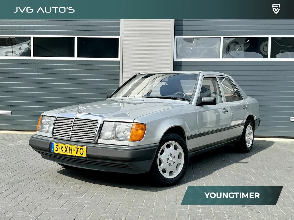 Mercedes-Benz 200-Serie (1987) — foto 1