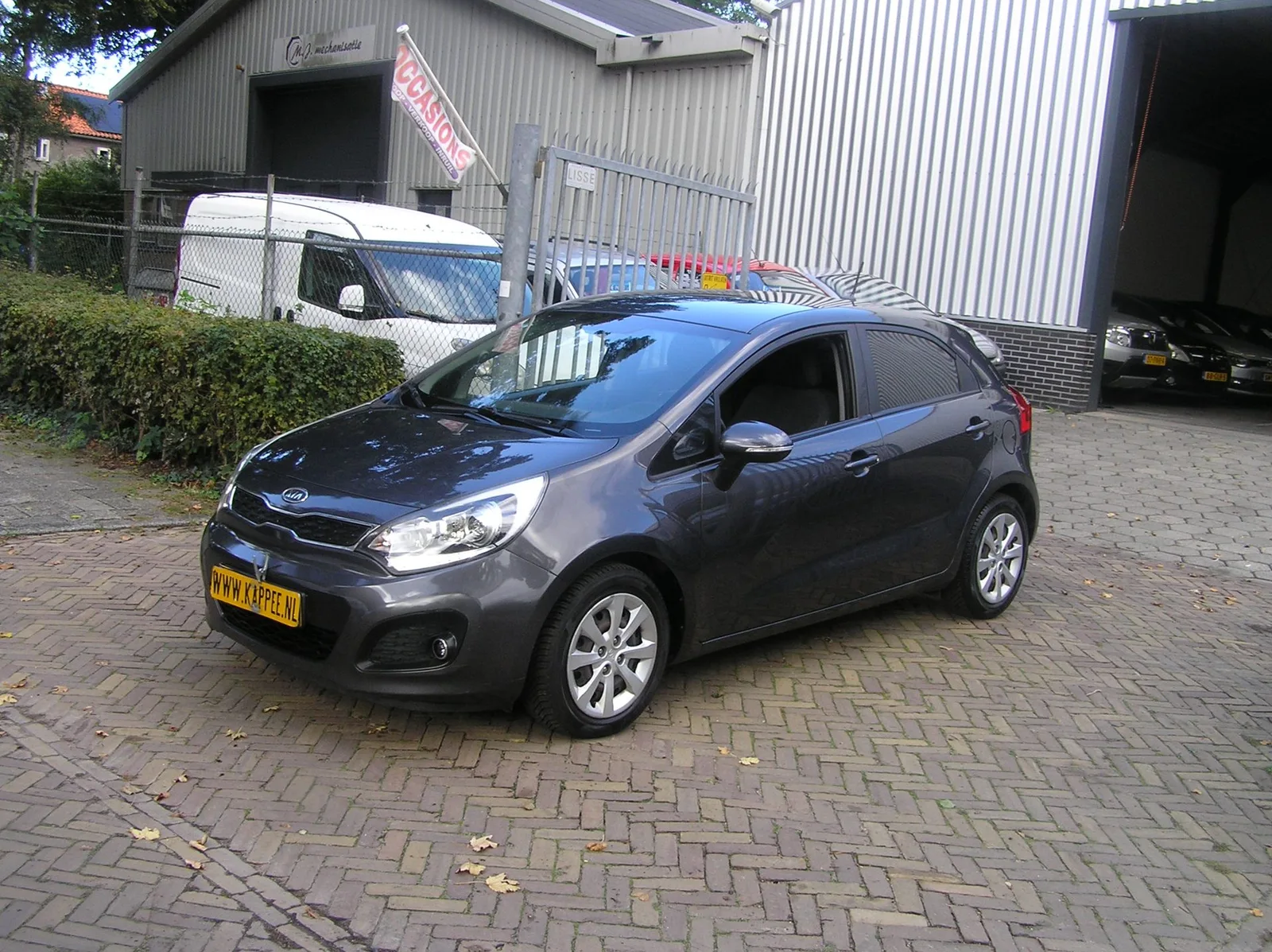 Kia Rio (2012) — foto 1