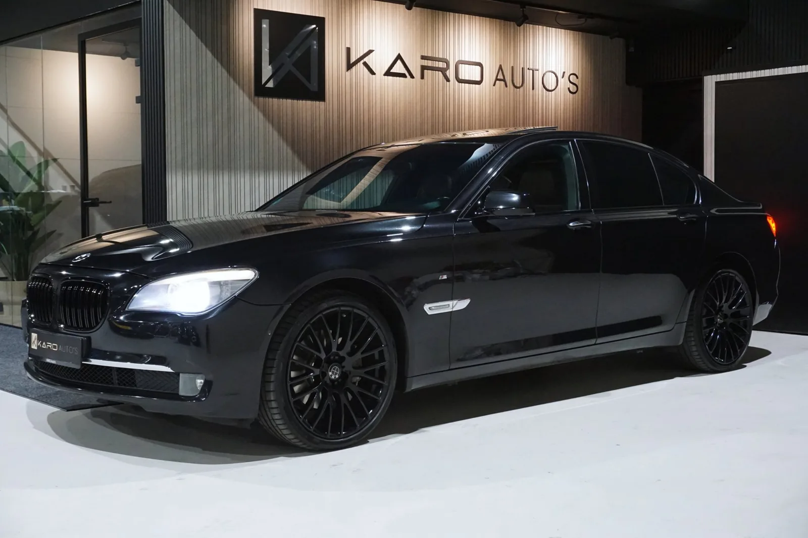 BMW 7-Serie (2011) — foto 1