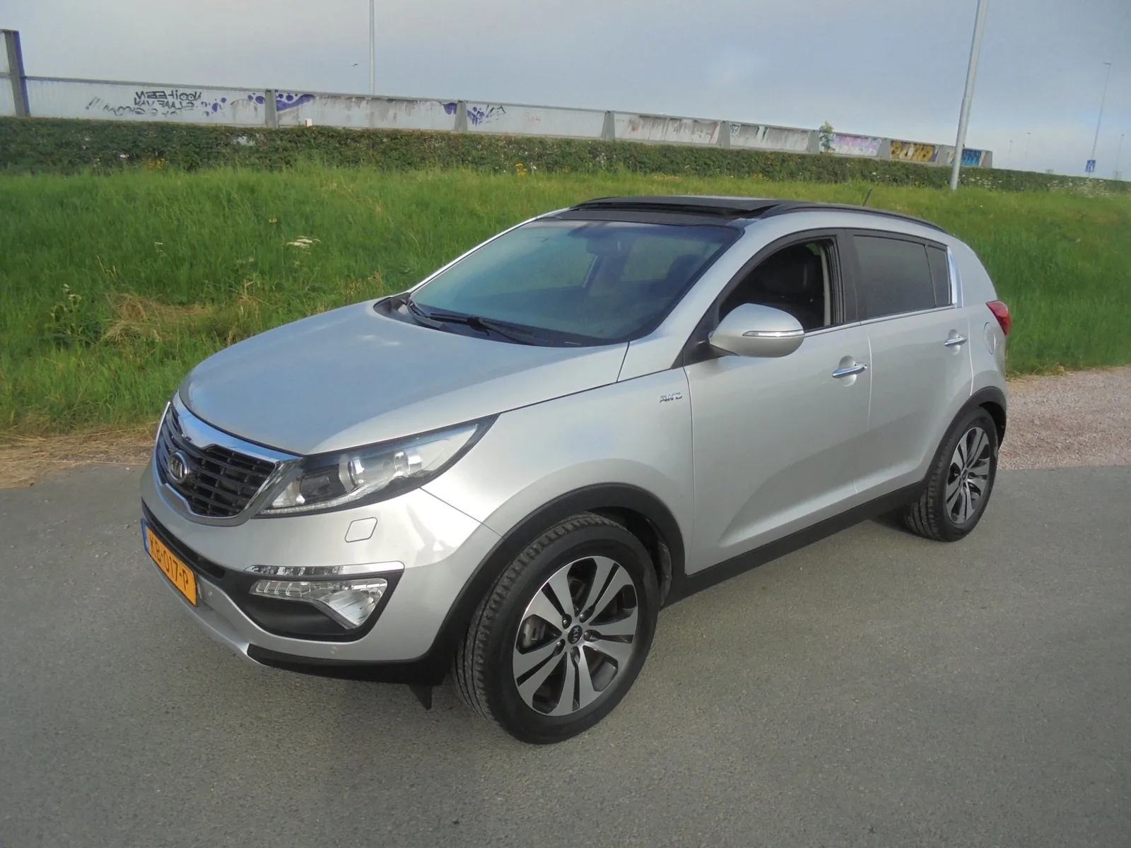 Kia Sportage (2012) — foto 1