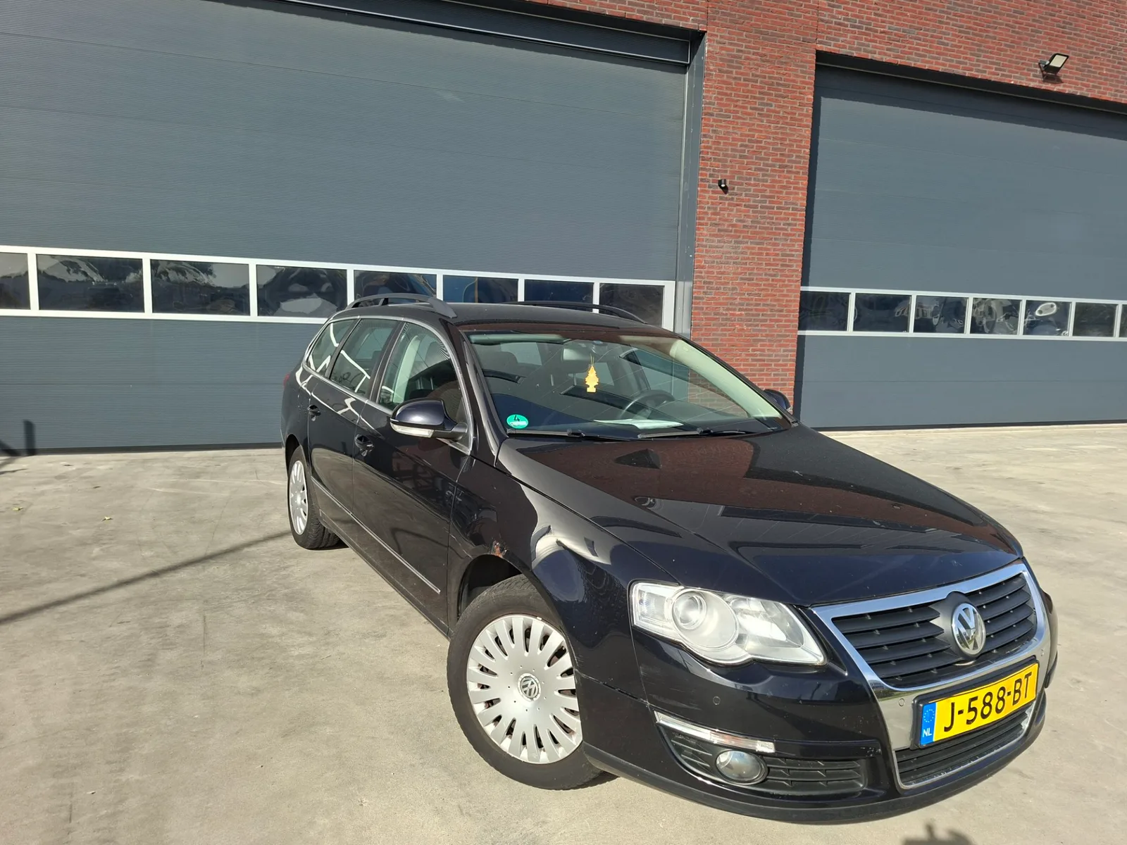 Volkswagen Passat (2009) — foto 1