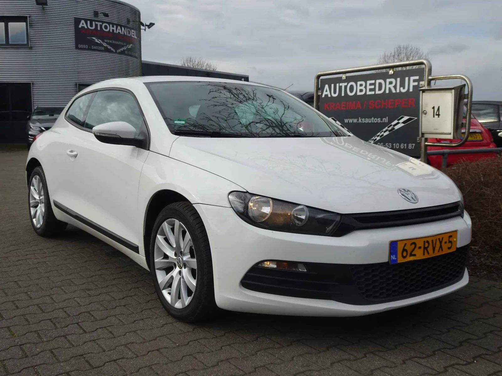 Volkswagen Scirocco (2011) — foto 1