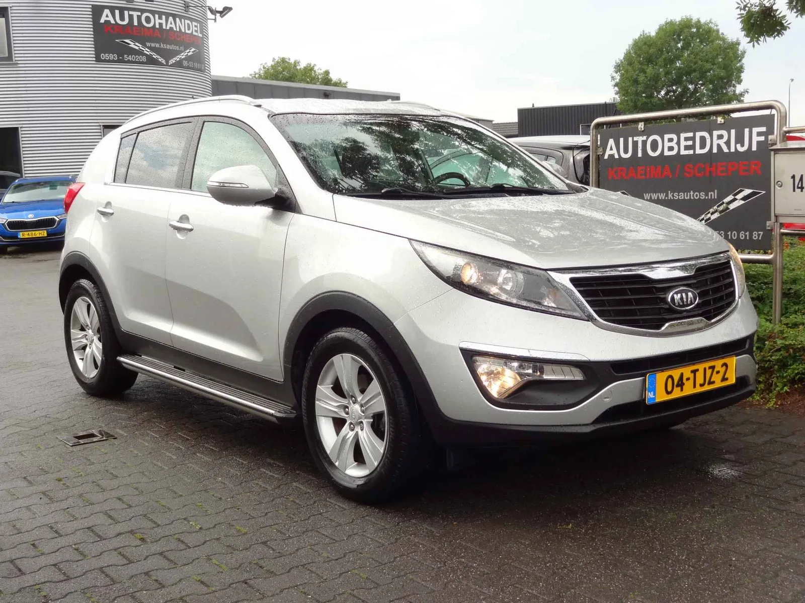 Kia Sportage (2012) — foto 1