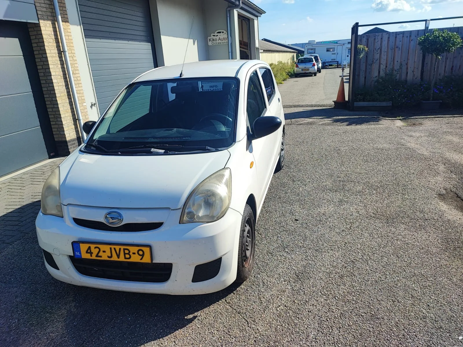 Daihatsu Cuore (2009) — foto 1