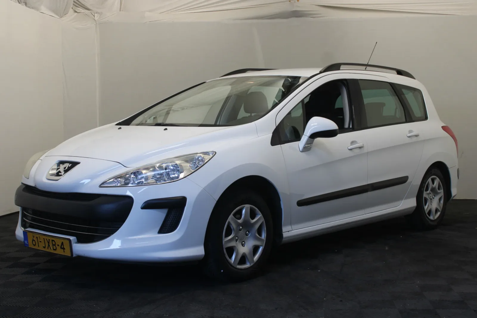 Peugeot 308 (2009) — foto 1