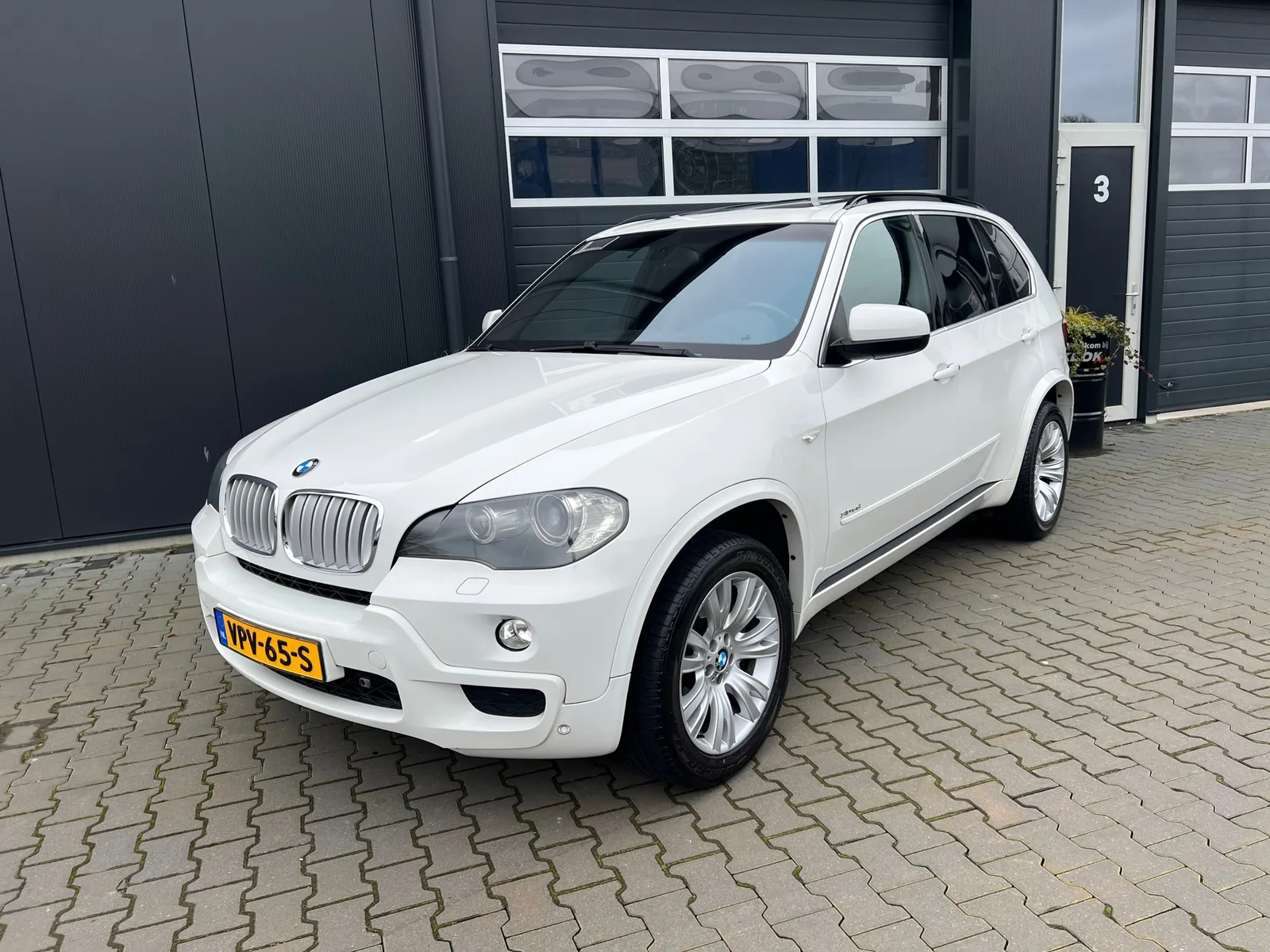 BMW X5 (2008) — foto 1