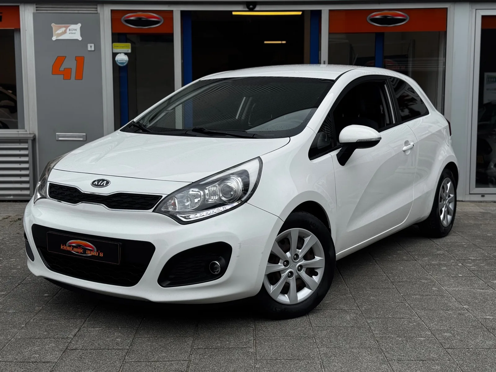 Kia Rio (2013) — foto 1