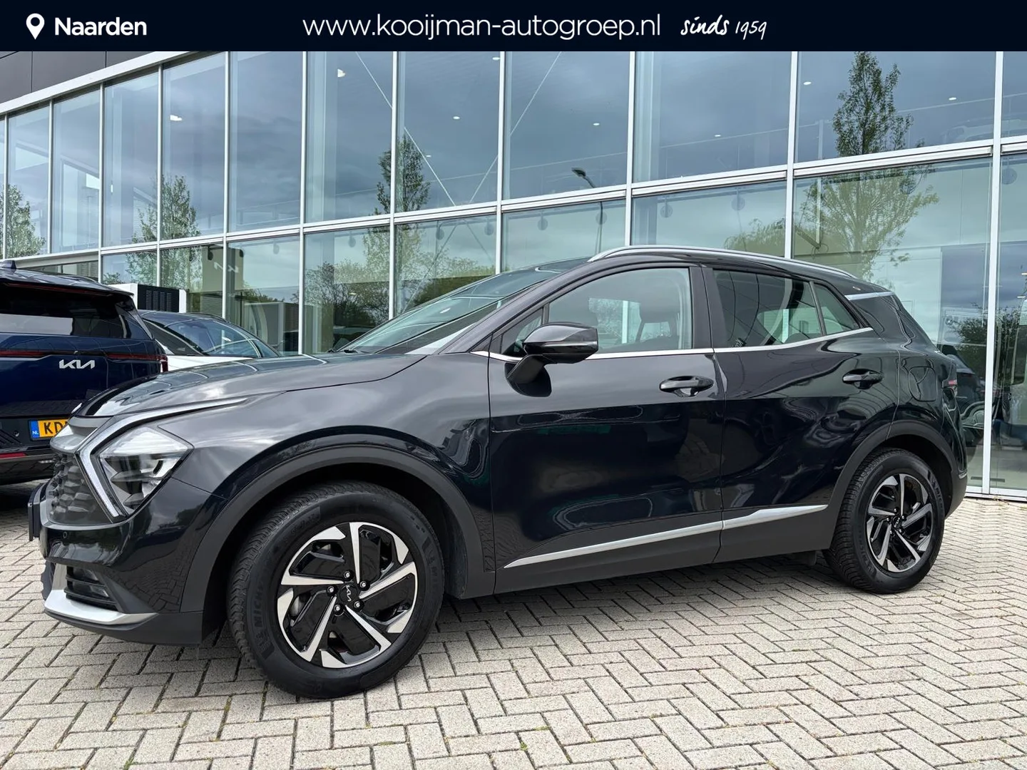 Kia Sportage (2022) — foto 1