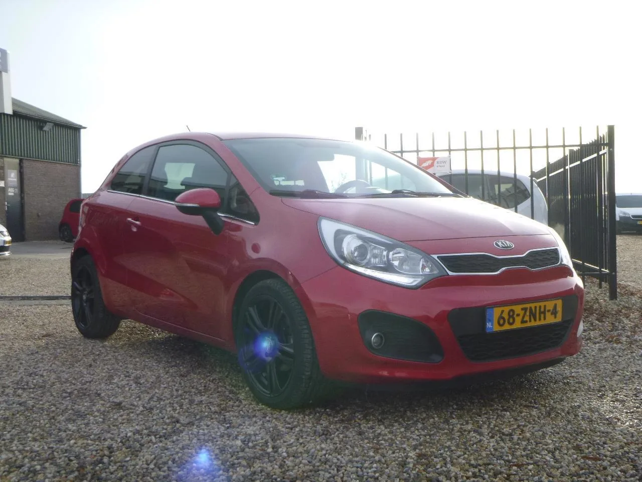 Kia Rio (2013) — foto 1