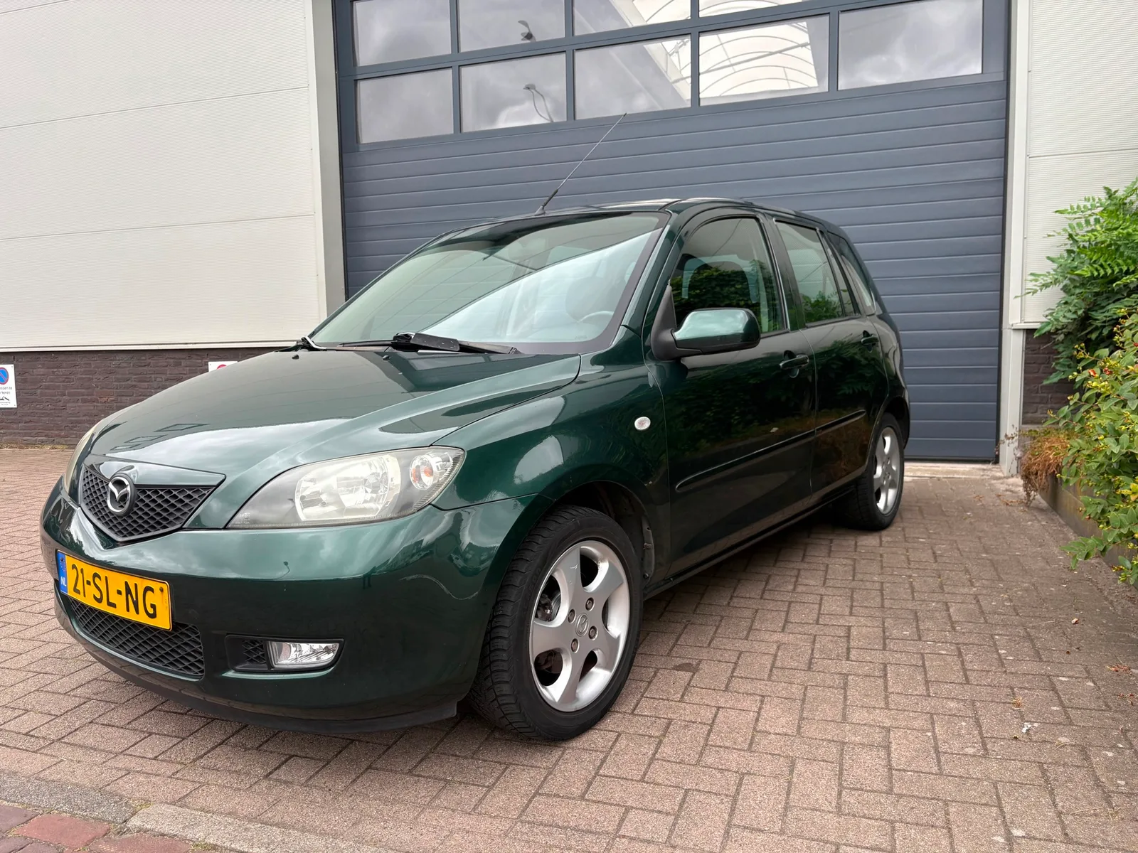 Mazda 2 (2006) — foto 1