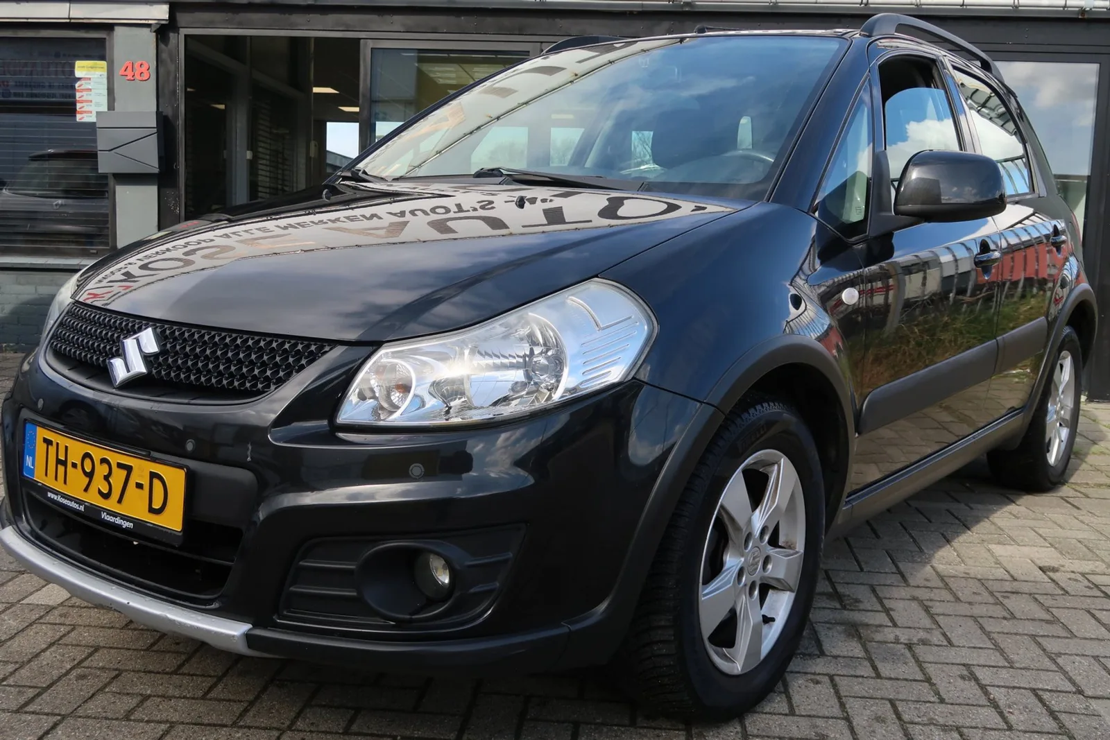 Suzuki SX4 (2012) — foto 1