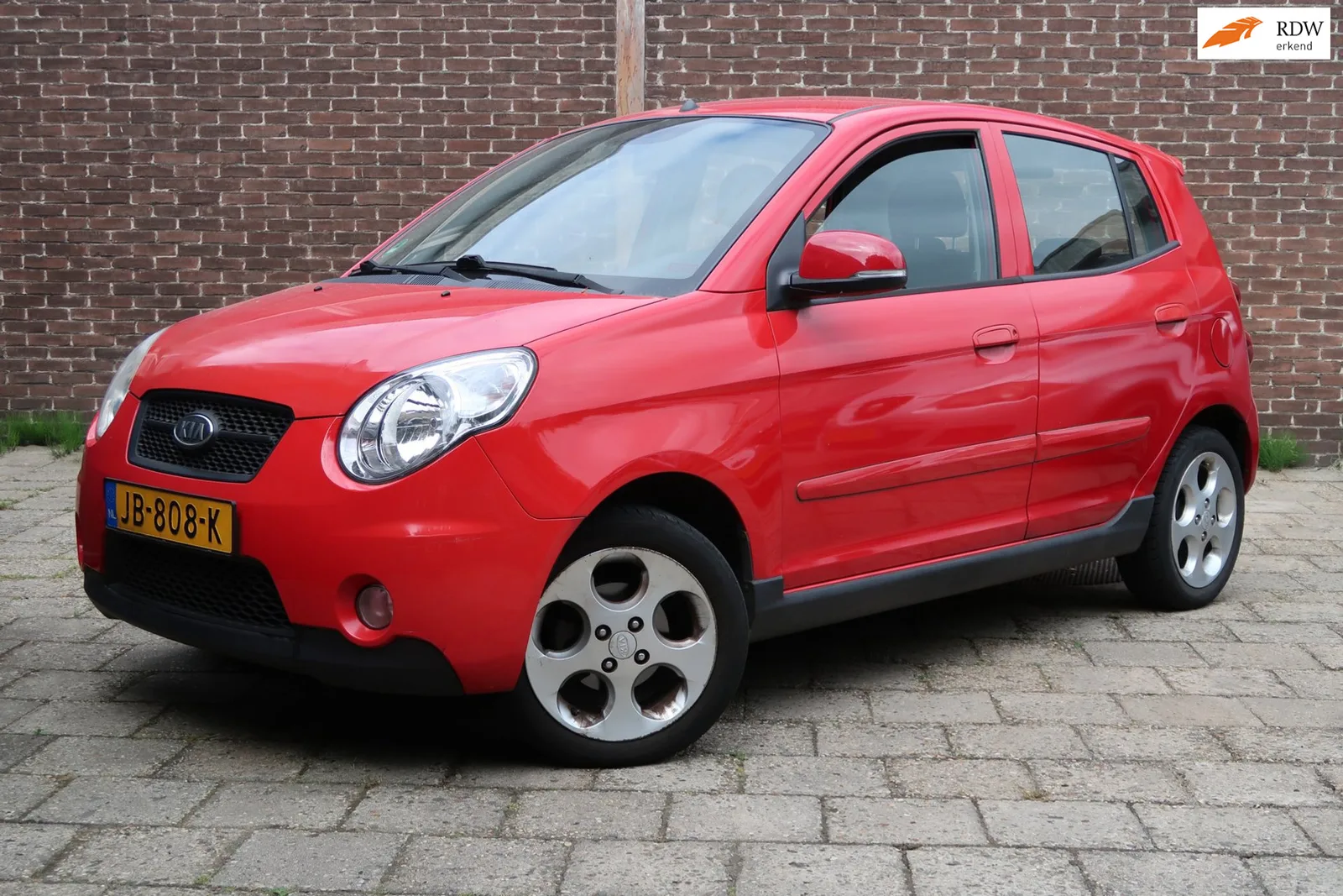 Kia Picanto (2009) — foto 1