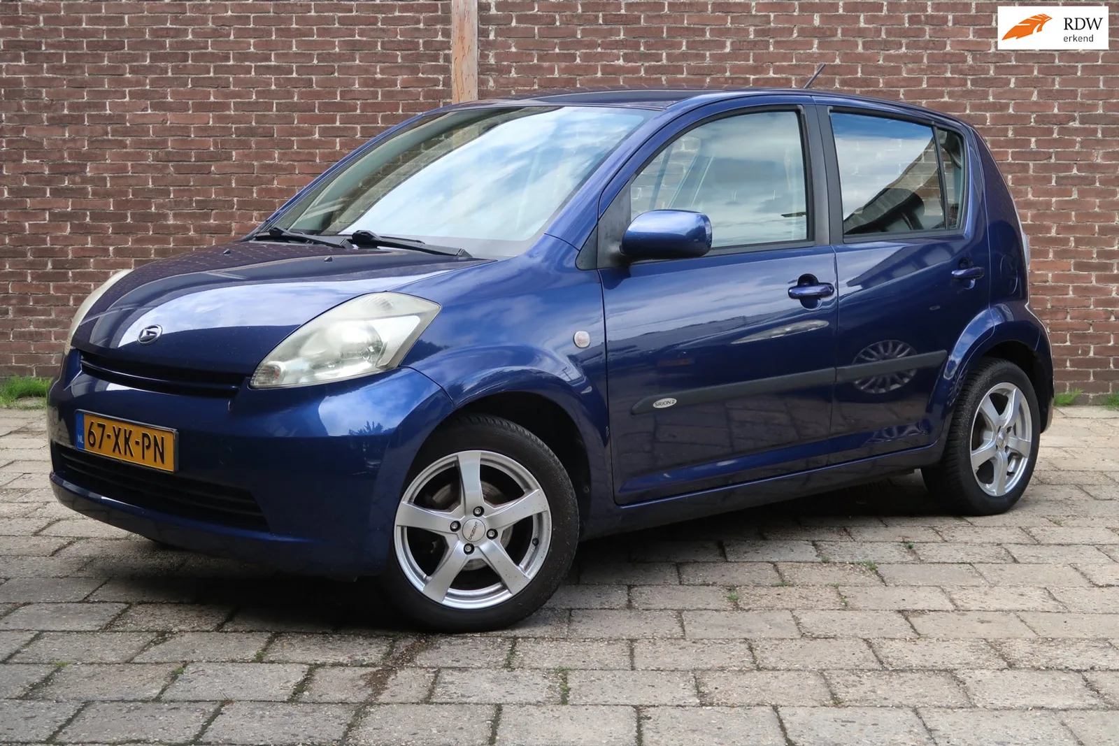 Daihatsu Sirion (2007) — foto 1
