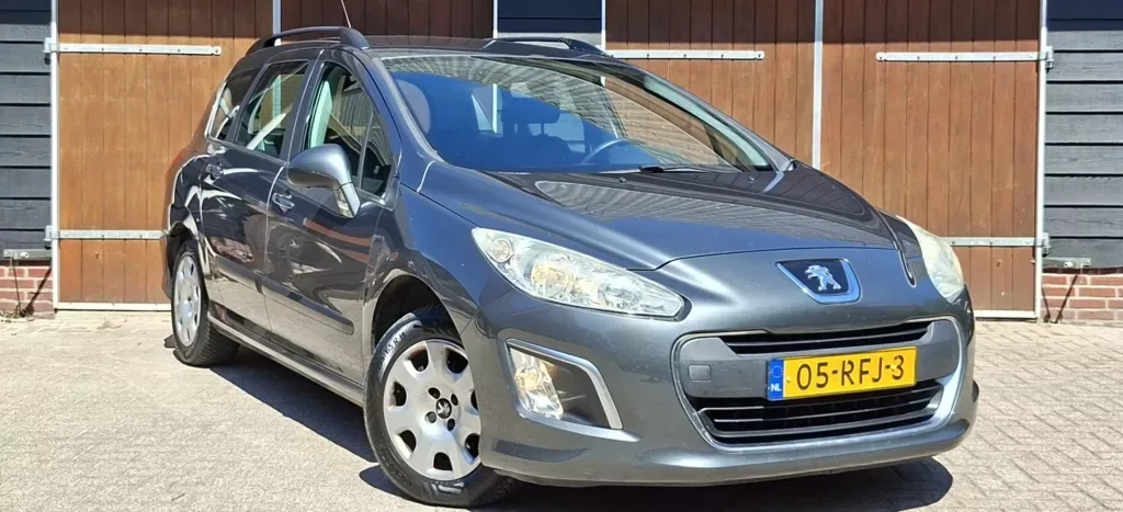 Peugeot 308 (2011) — foto 1