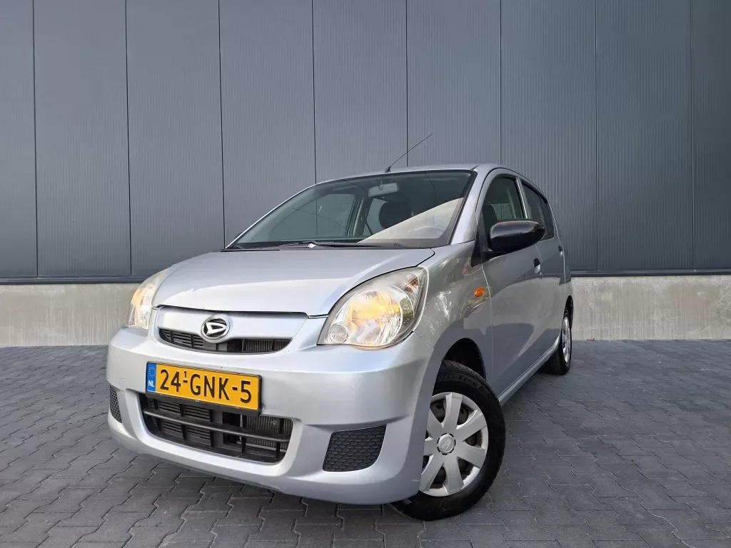 Daihatsu Cuore (2008) — foto 1