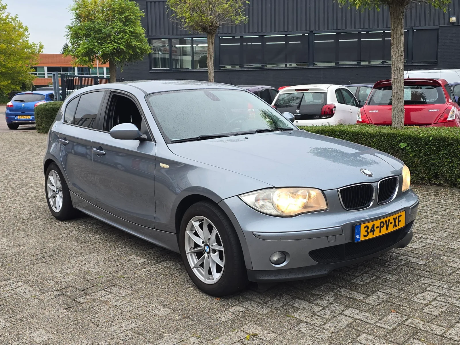 BMW 1-Serie (2005) — foto 1