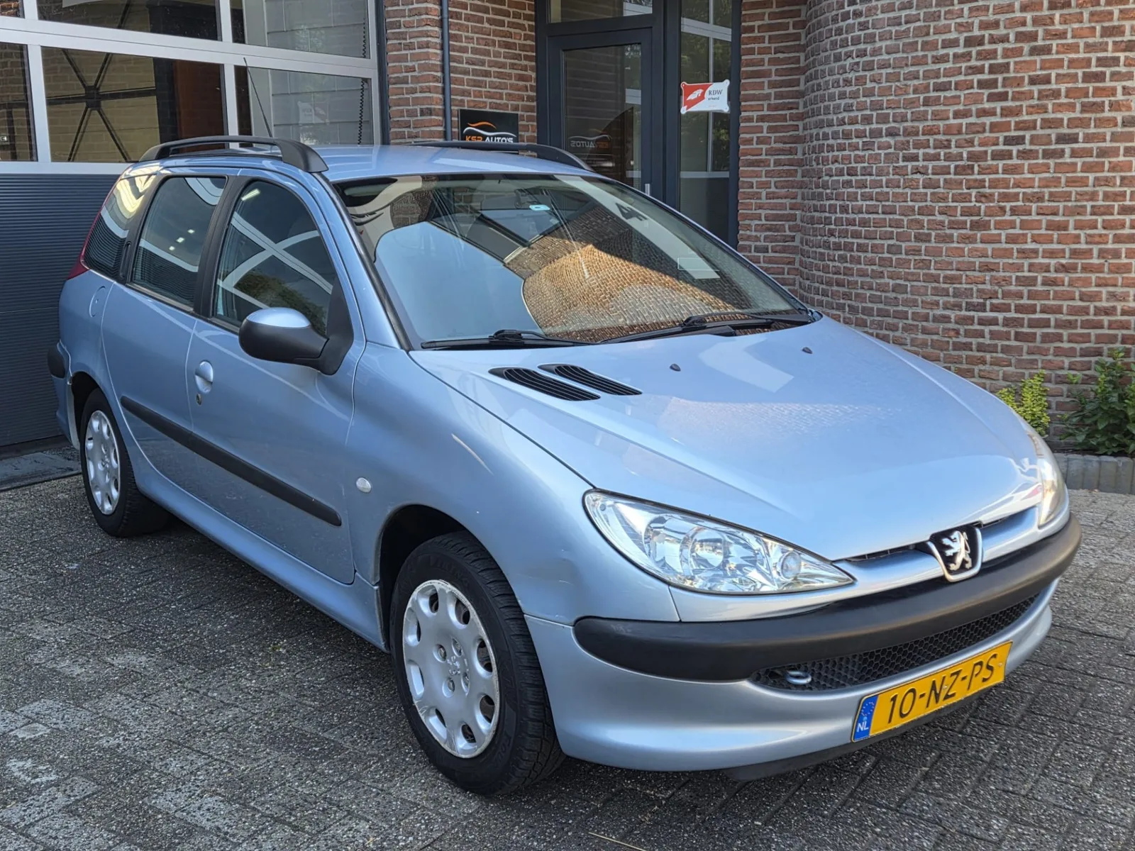Peugeot 206 (2004) — foto 1