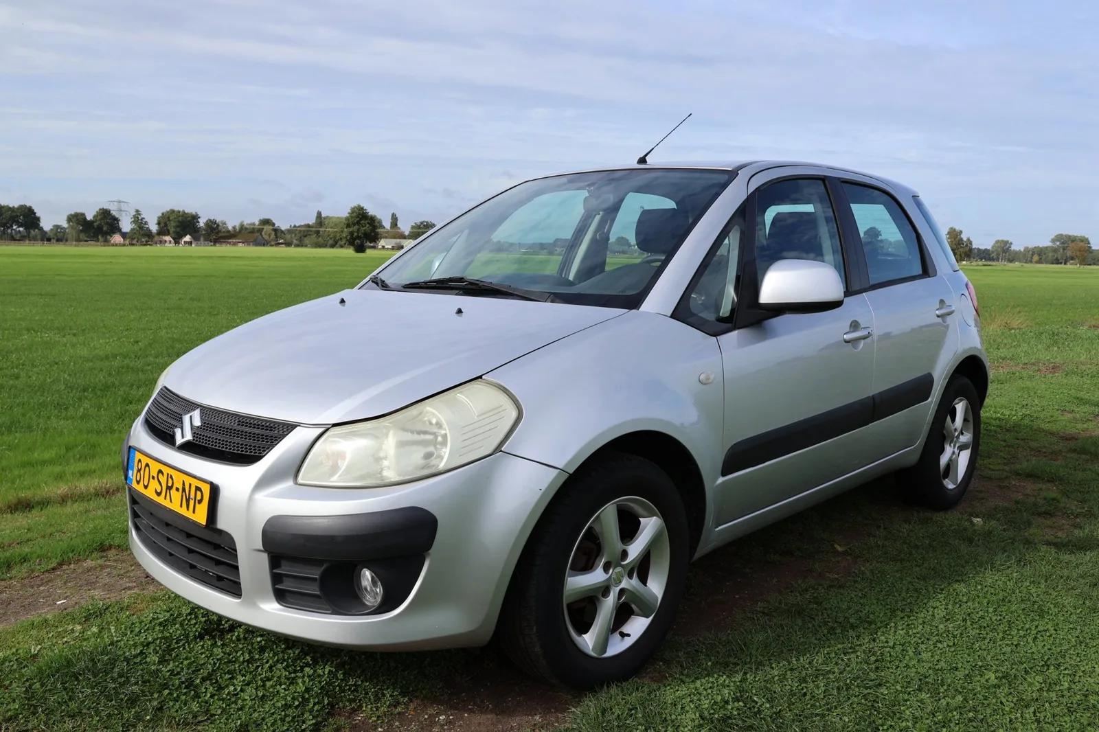Suzuki SX4 (2006) — foto 1