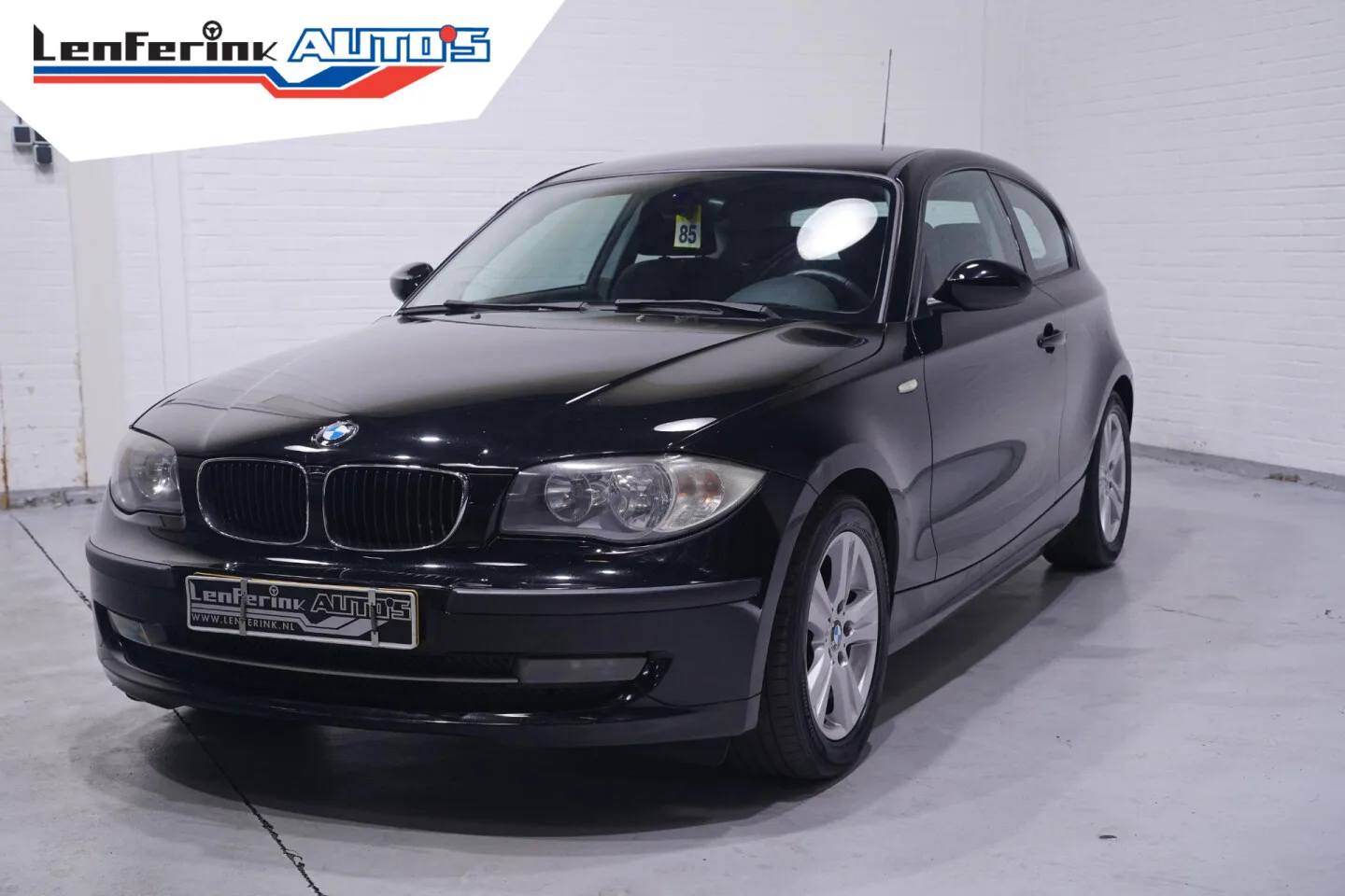 BMW 1-Serie (2009) — foto 1