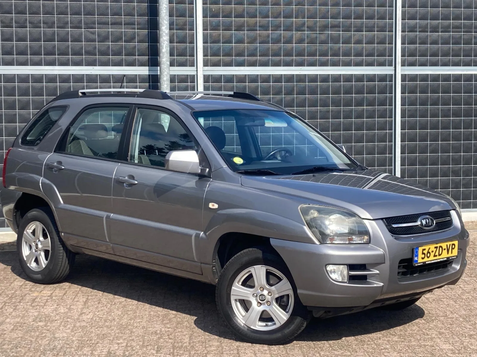 Kia Sportage (2008) — foto 1