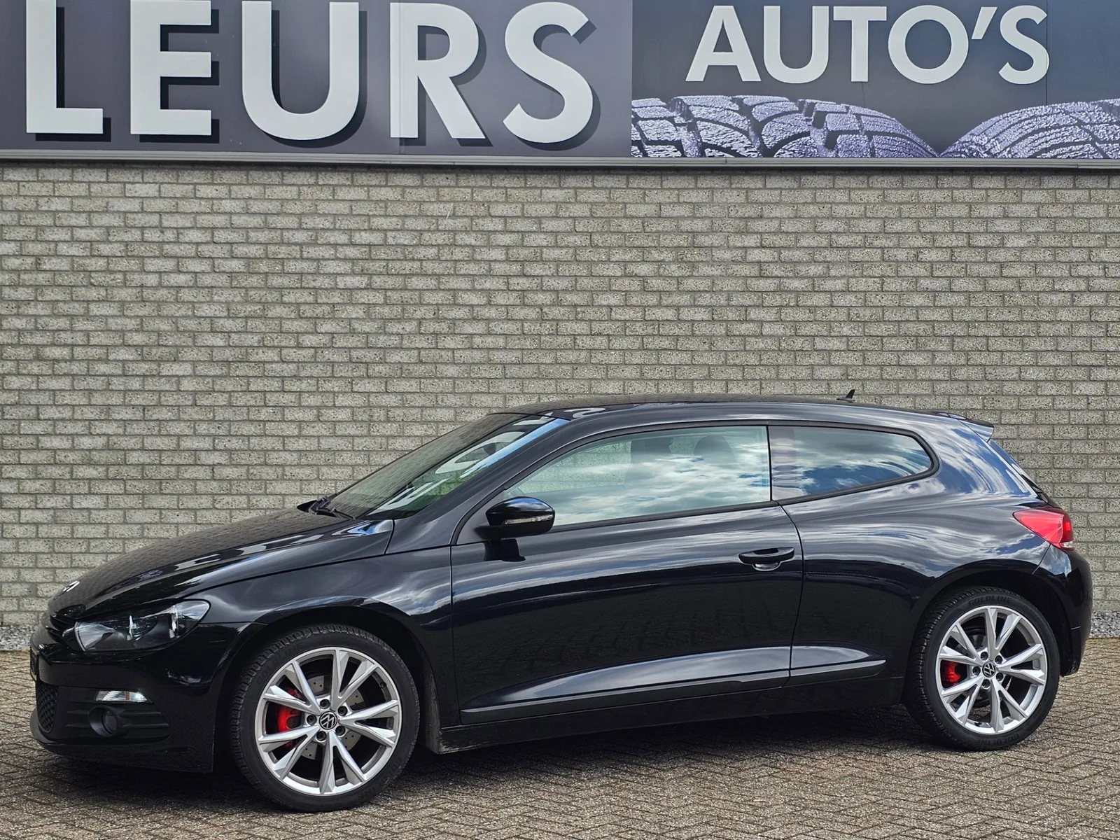 Volkswagen Scirocco (2013) — foto 1