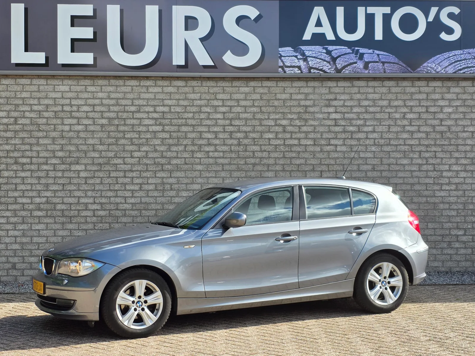 BMW 1-Serie (2011) — foto 1
