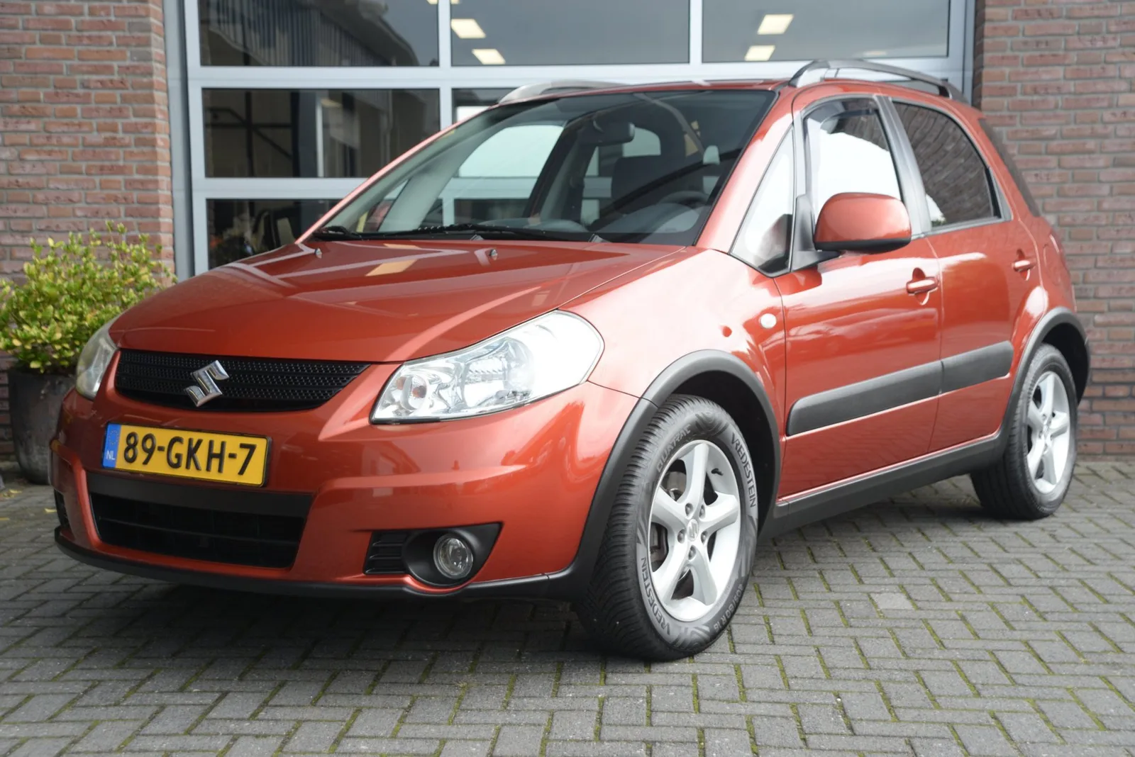 Suzuki SX4 (2008) — foto 1