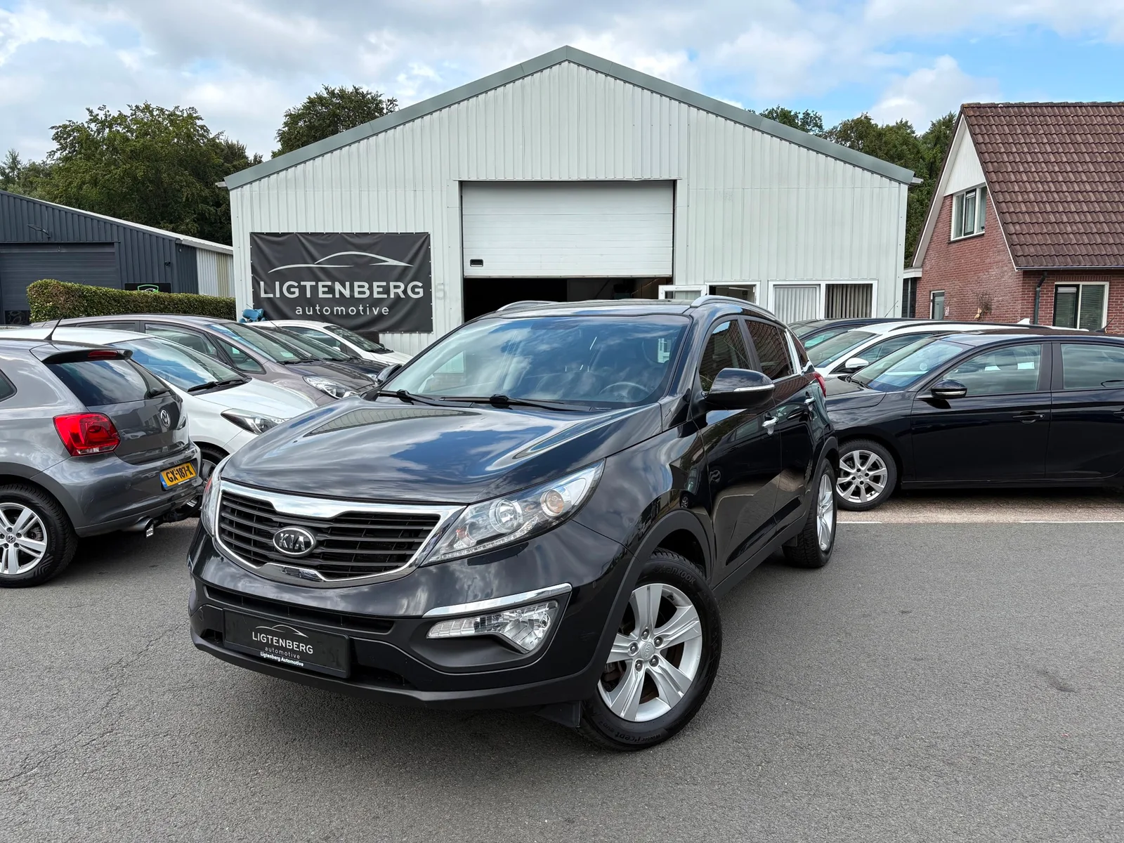 Kia Sportage (2012) — foto 1