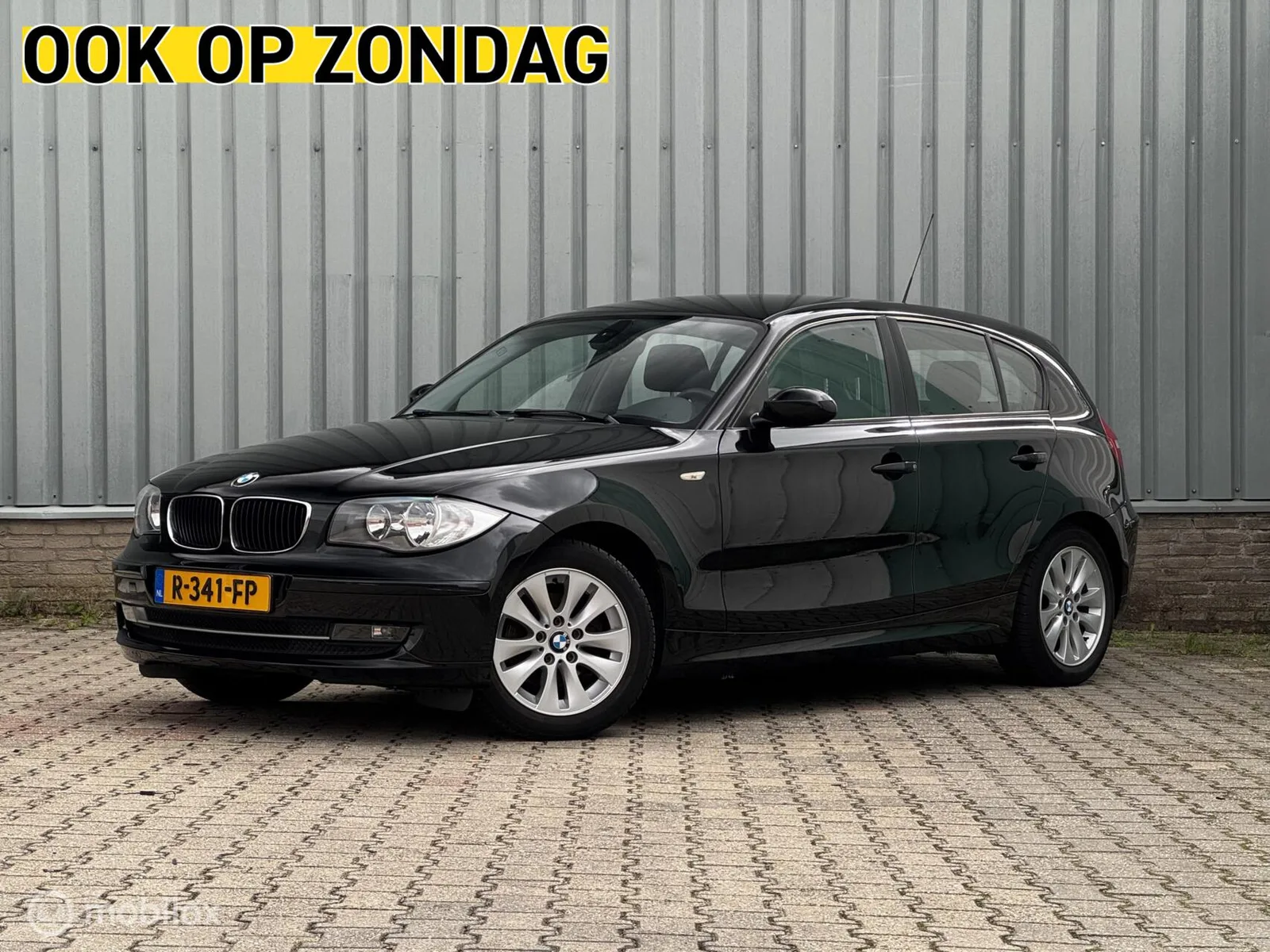 BMW 1-Serie (2009) — foto 1