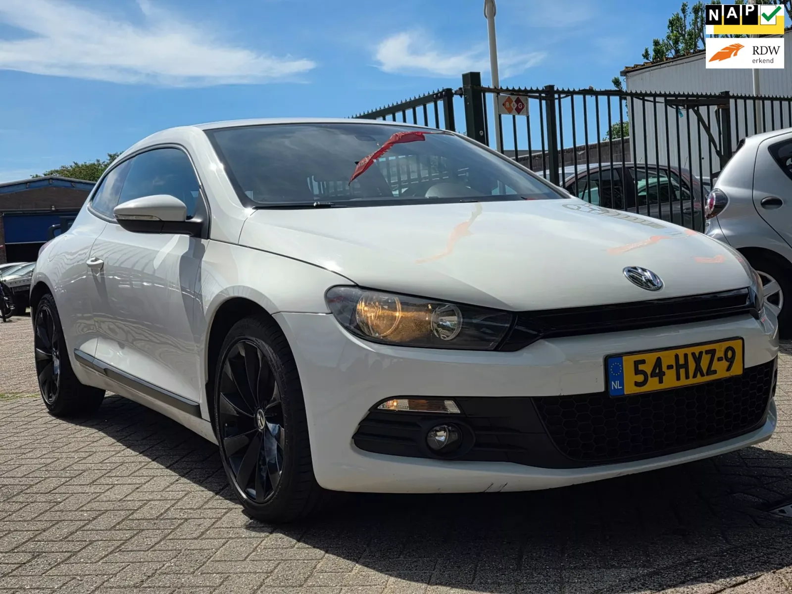 Volkswagen Scirocco (2009) — foto 1