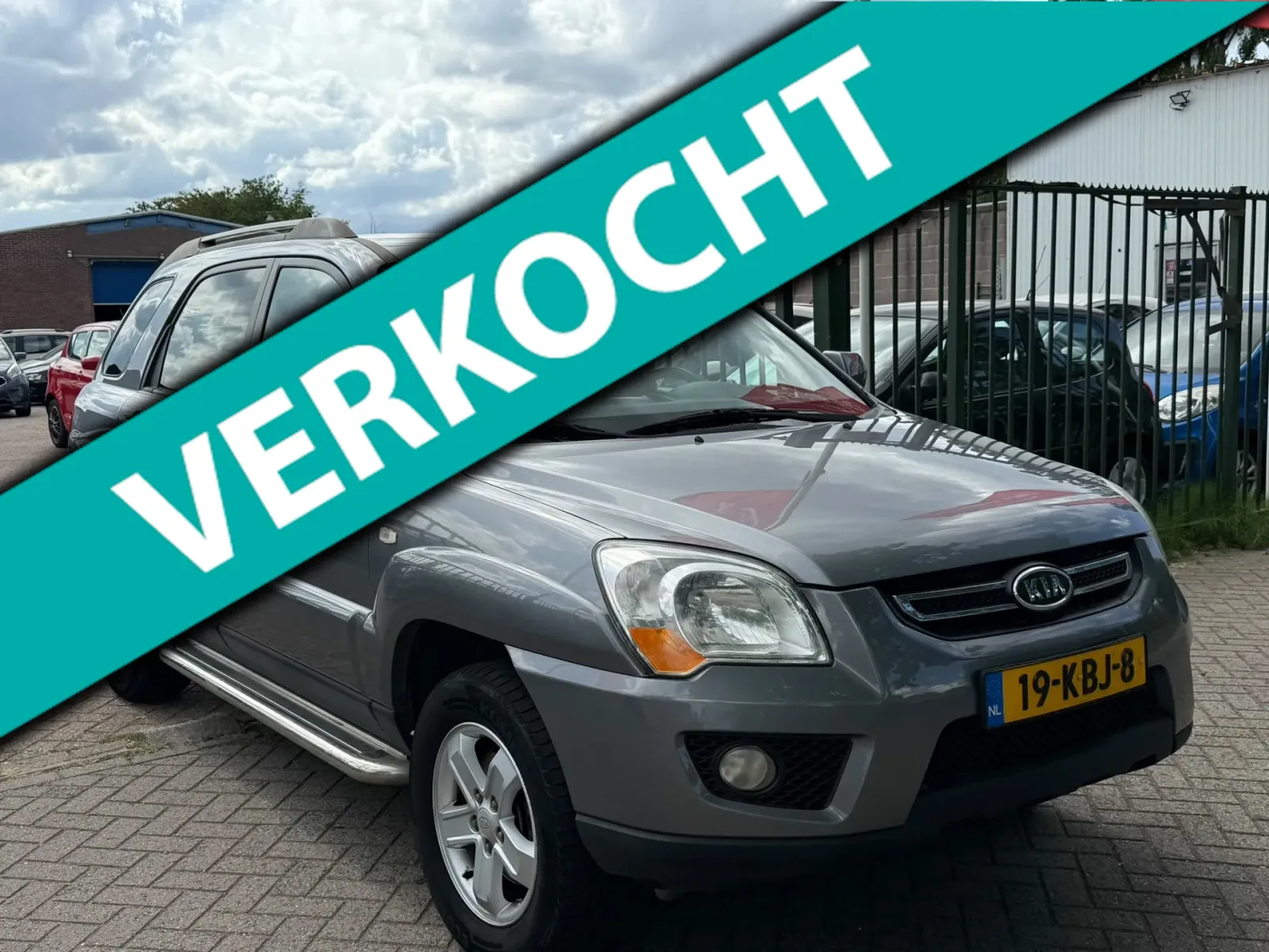 Kia Sportage (2009) — foto 1