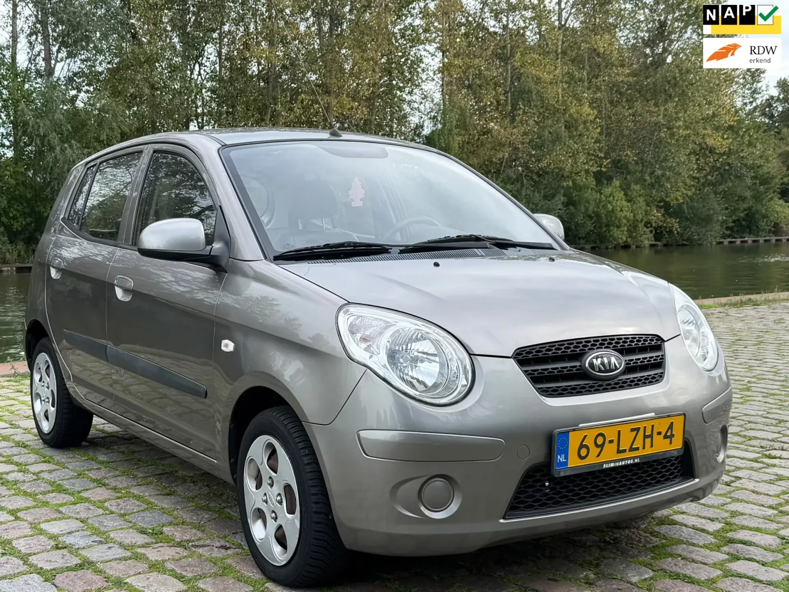 Kia Picanto (2010) — foto 1