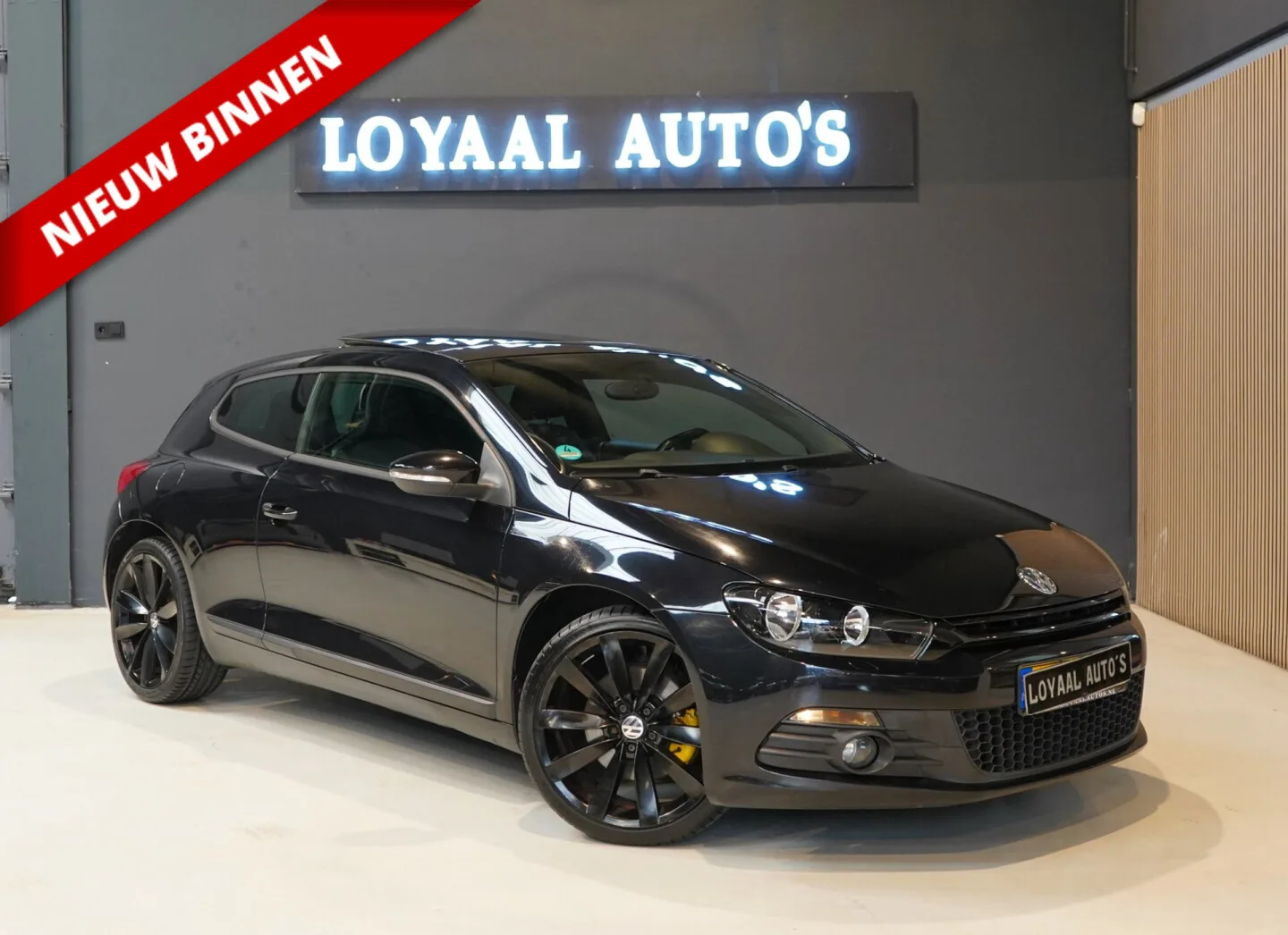 Volkswagen Scirocco (2011) — foto 1
