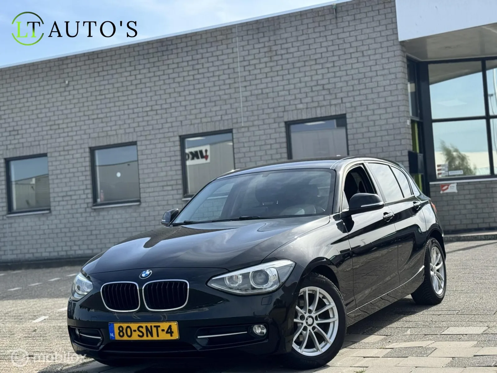 BMW 1-Serie (2011) — foto 1
