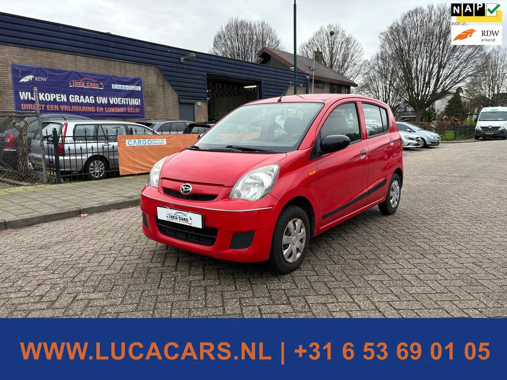 Daihatsu Cuore (2008) — foto 1
