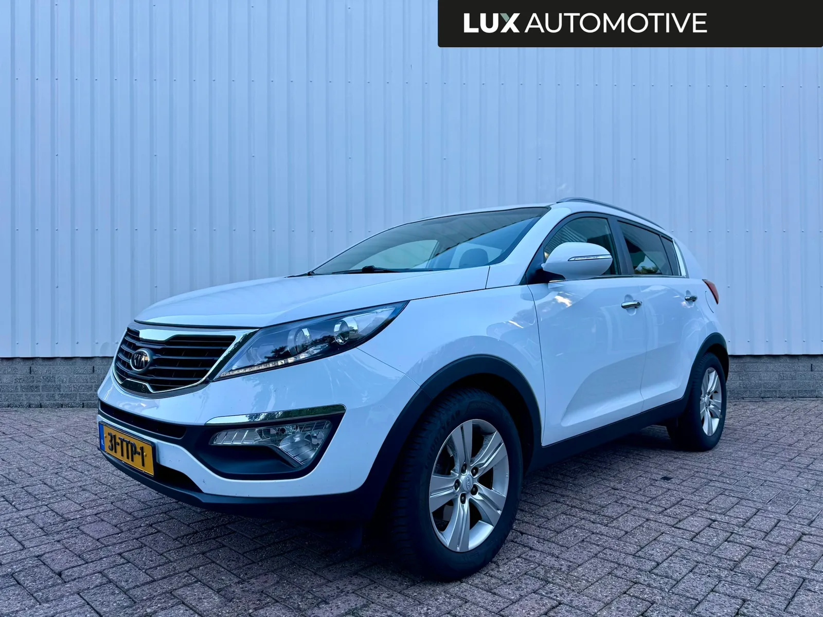 Kia Sportage (2012) — foto 1