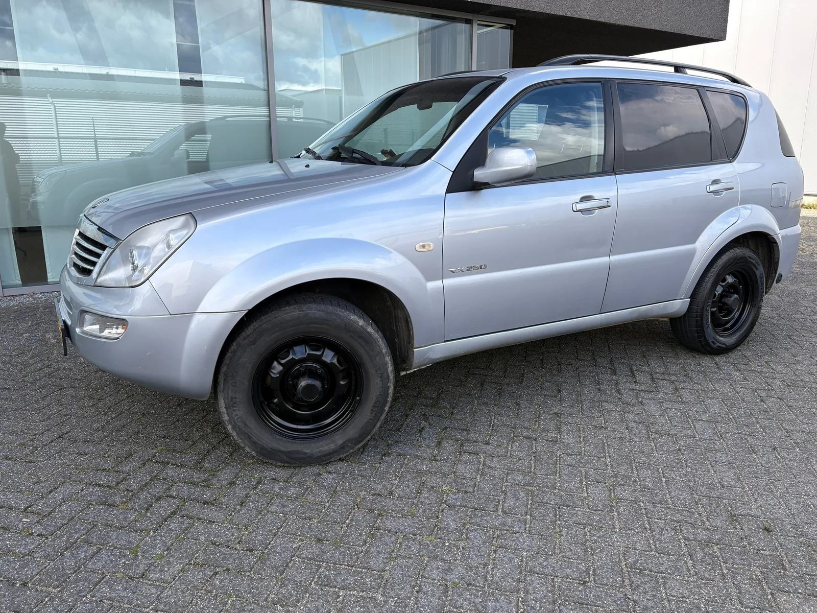 SsangYong REXTON (2011) — foto 1