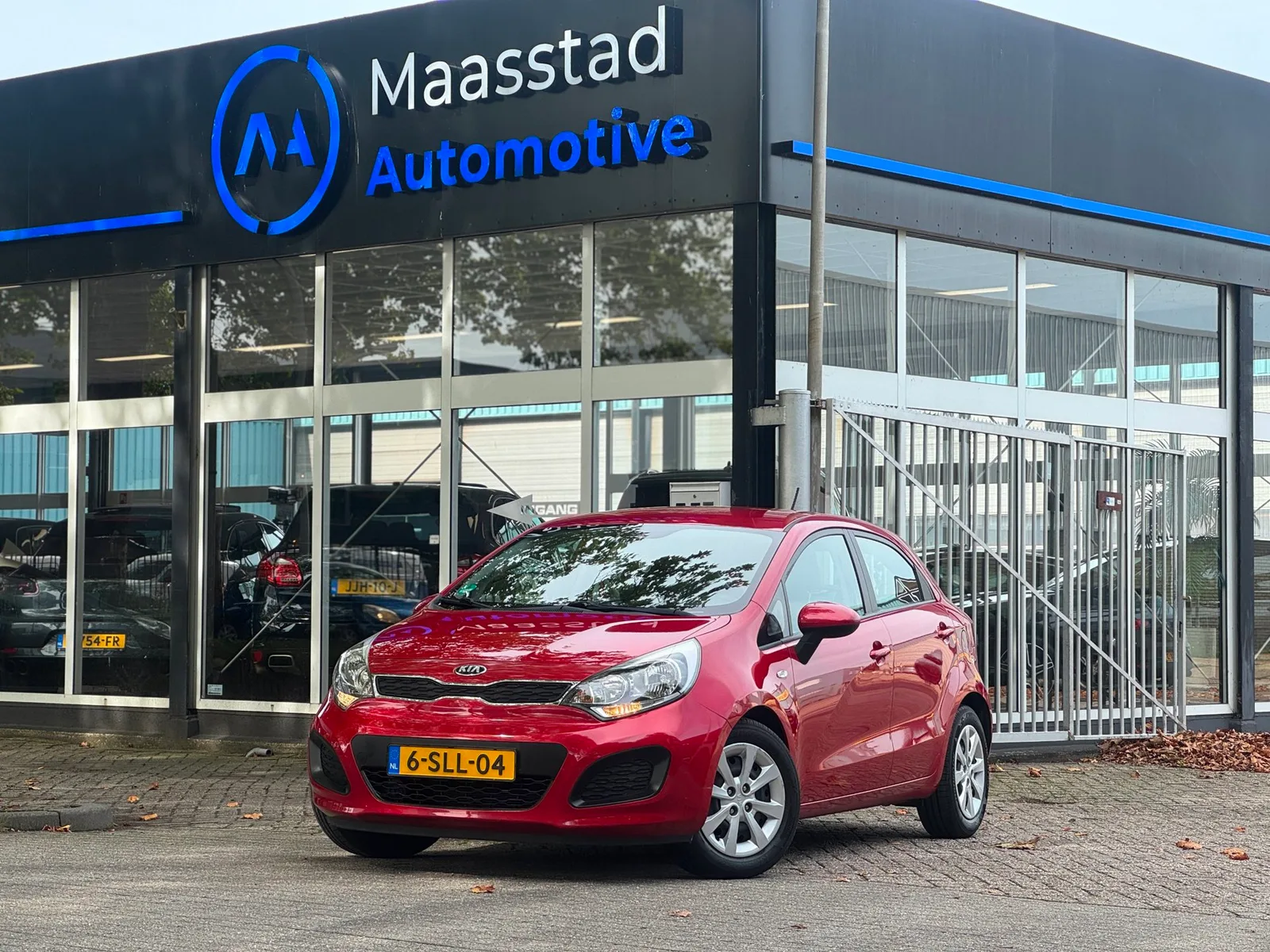 Kia Rio (2013) — foto 1