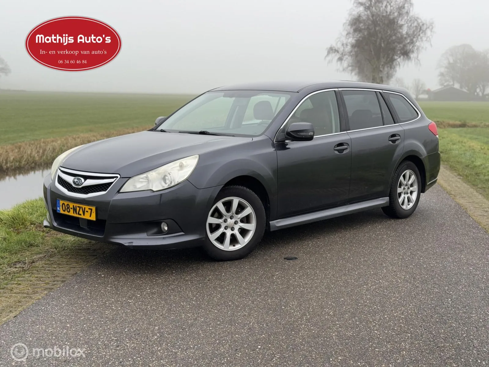 Subaru Legacy (2011) — foto 1