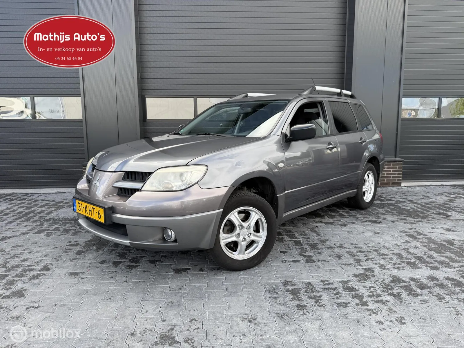 Mitsubishi Outlander (2009) — foto 1